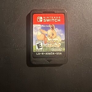 Nintendo Switch Pokémon Let's Go Eevee Cartridge - Red and Black